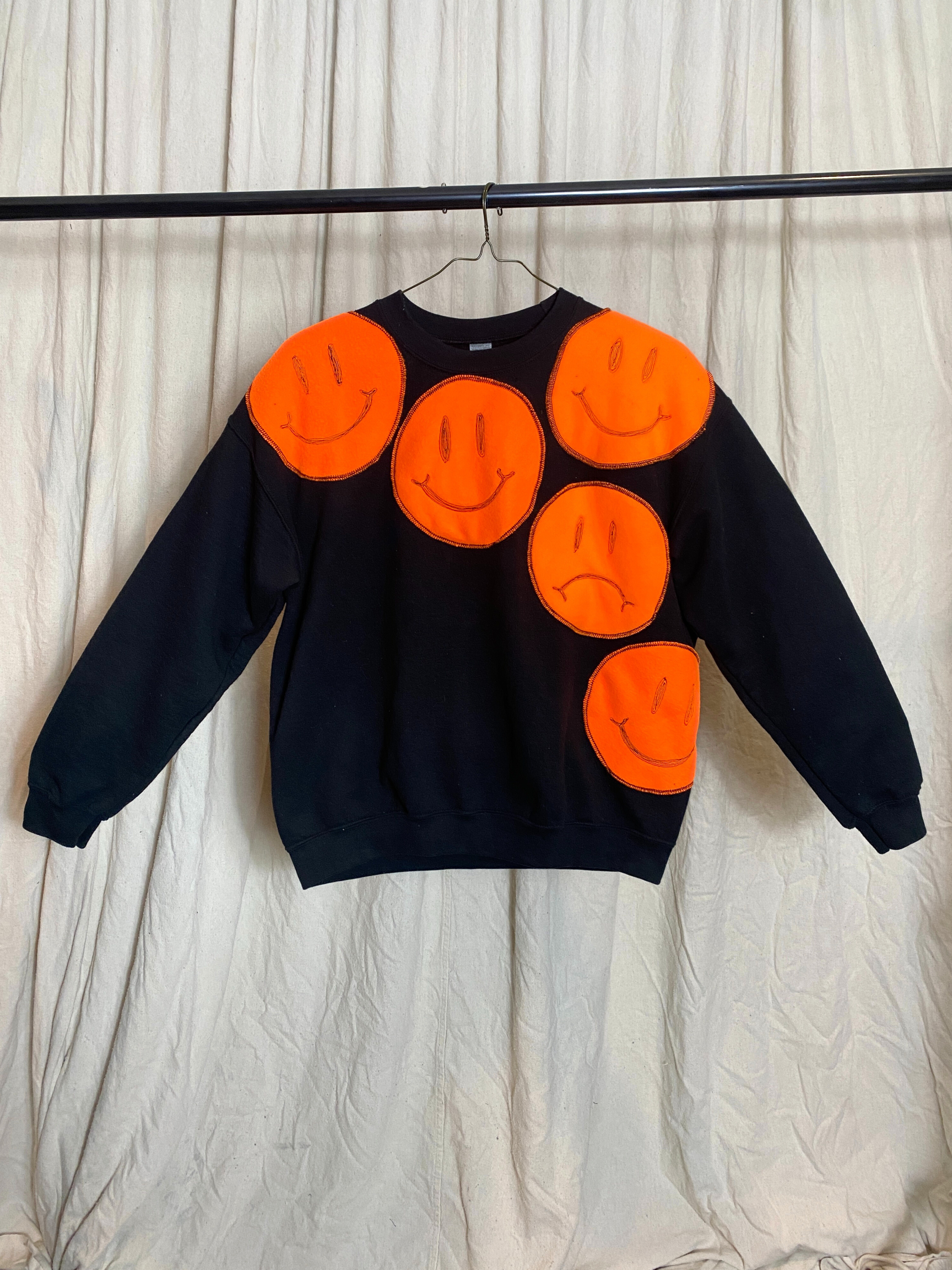 Moody Genderless Sweatshirt- Black Crewneck with Orange Fleece Patches of Smiley Faces